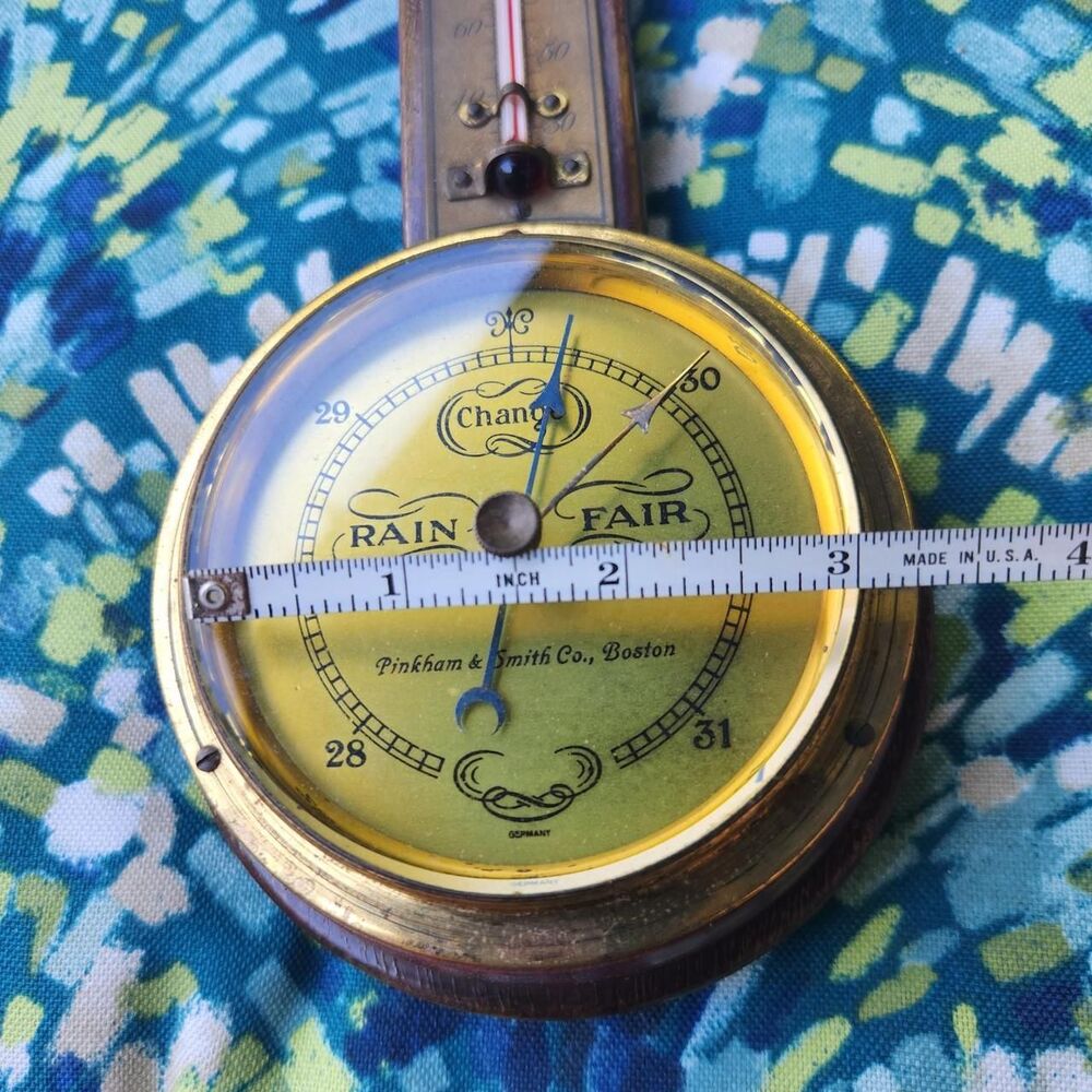 This is a vintage aneroid barometer $...